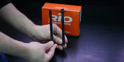 Parafusos do cabeçote RIO em frente à embalagem do produto